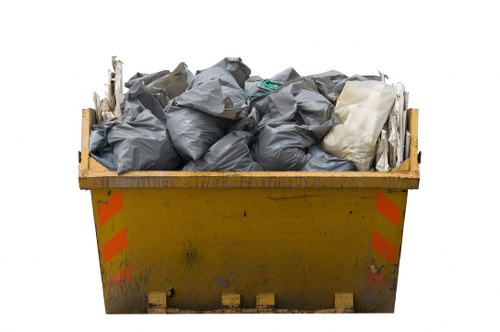 Professional house clearance team in Bethnal Green removing items