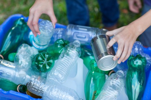 Professional home clearance staff sorting items